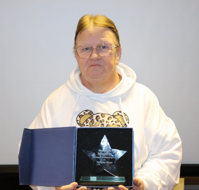 Margaret volunteer at charity in wigan